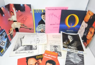 (Miscellaneous Lot of Magic Ephemera, How-To Instructionals, Performer’s Programs, Etc.) Lance Burton Program Book [SIGNED, with 2 Ticket Stubs and Show Pamphlet]; Marco the Magi’s Production of “Le Grand David and his own Spectacular Magic Company” (Performance Program); Expressions of a World Champion Magician [SIGNED]; Meir Yedid’s Memorable Magic: English/French Edition [SIGNED]; Kenneth Feld Presents Siegfried and Roy at the Mirage (1990) ]; Kenneth Feld Presents Siegfried and Roy at the Mirage (1998); Lance Burton: Master Magician; Cirque Du Soleil (Souvenir Program, 1998, with 2 Ticket Stubs); Stevens Magic Emporium Presents: Solid Silver Levitation; The Crazy Man’s Handcuffs; Blue Crystal Magic Trick Set (With “Crystal” box, plastic gimmick card, transparent blue sheet, and instructions); Fire Proof (Magic Trick Pamphlet); The How To Book of the Zombie; Further Tips on Zombie; Fire Magic (Fire Eating Plus Many Fire Tricks); Cardboard Connection: “The World’s Only Linking Card Routine”; SIGNED Headshot of Andre Kole with Performance Pamphlet; SIGNED Cardboard Photograph of Mark Wilson; The Upton Rising Card Trick (Hand Printed Card Numbered 324/600); Flaming Head Chest (Printed Instructions); The P.K. Factor (Printed Instructions); Steve Dusheck’s World Famous Wunderbar [SIGNED]; Steel Ball and Mirror (Printed Instructions); Impromptu Linking Coathangers (Printed Instructions); Squeeze Through (Printed Instructions); Homemade DVD Labeled “Siegfried and Roy’s Last Performance 20/20”; DVD Instructions for 2 Magic Tricks (Dani DaOrtiz’s Followers and Lennart Green’s Mirror Count); Wonder by Design DVD; Franz Steinmeyer’s Palingenesia DVD; Material from an Unincluded/Unknown Book