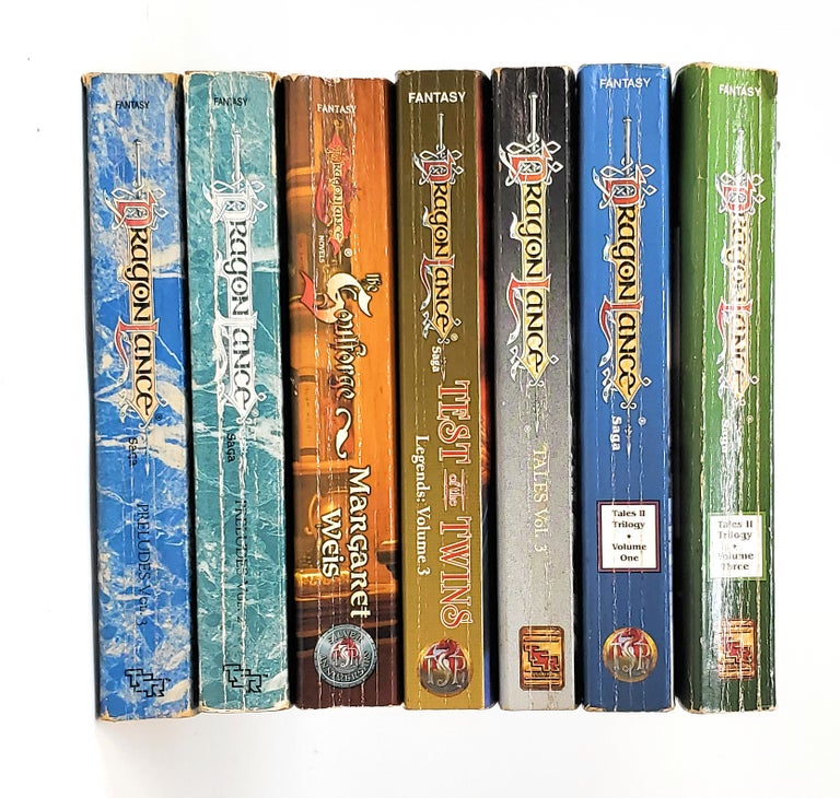 Item #10980 (7 Assorted Dragon Lance Novels) Legends: Volume 3, Test of the Twins; Tales: Volume 3, Love and War; Tales II Trilogy: Volume 1, The Reign of Istar; Tales II Trilogy: Volume 3, The War of the Lance; The Raistlin Chronicles: Volume 1, The Soulforge; Preludes: Volume 2, Kendermore; Preludes: Volume 3, Brothers Majere. Margaret Weis, Tracy Hickman, Michael Williams, Richard A. Knaak, Mary Kirchoff, Kevin Stein.
