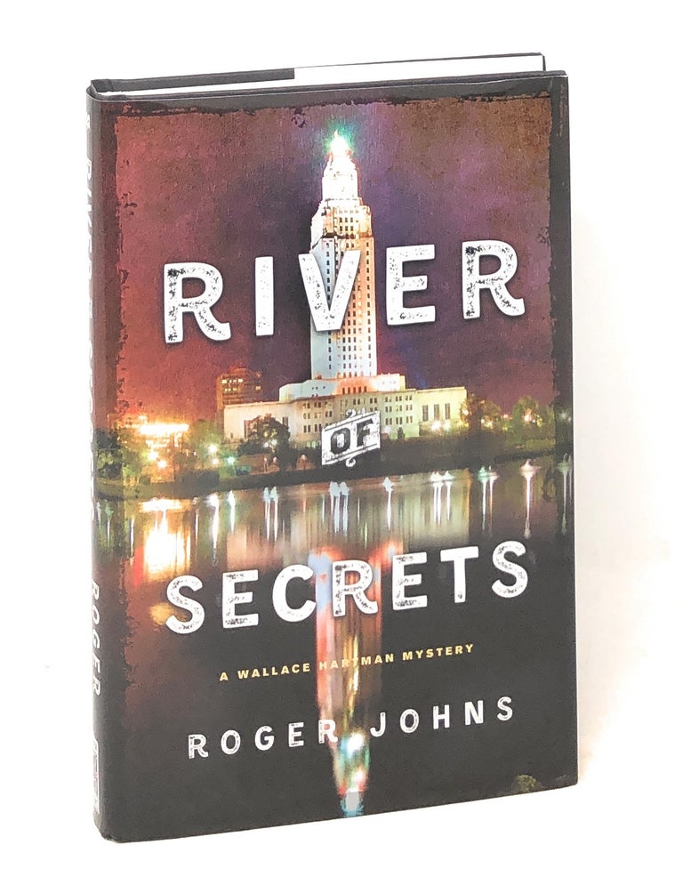 Item #6048 River of Secrets: A Wallace Hartman Mystery. Roger Johns.